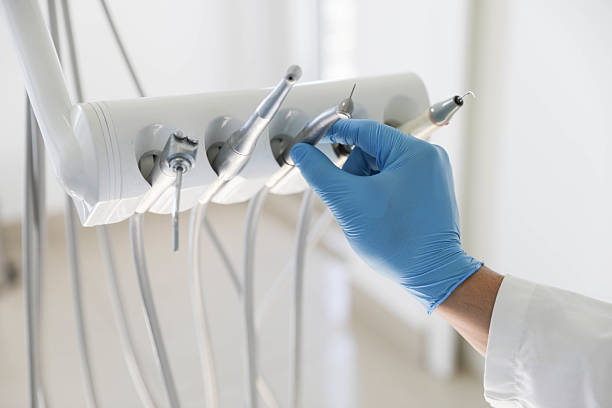 Professional Tooth Extraction technician working in Ellsworth County County, KS